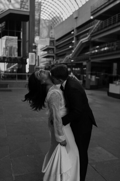 couple kissing intimate moment with Colorado photographer 