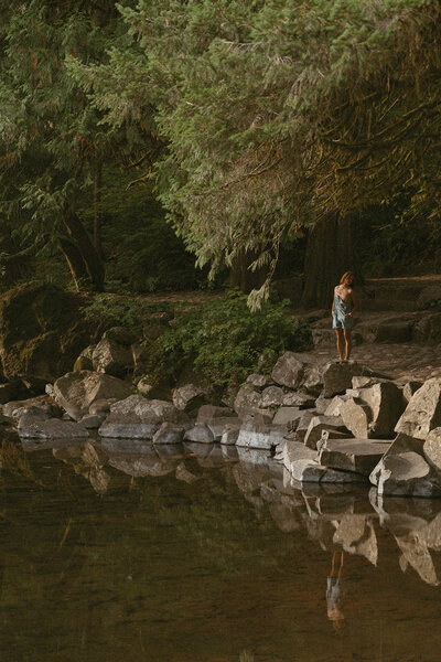 girl standing on trail in washington nature park