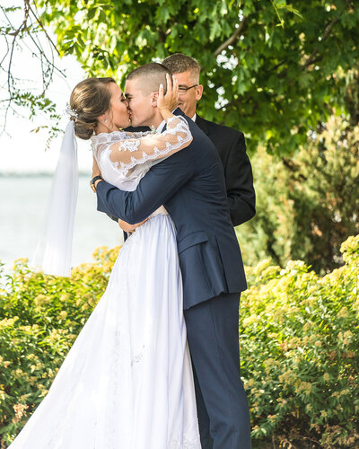 Bride and groom looking at each other smiling