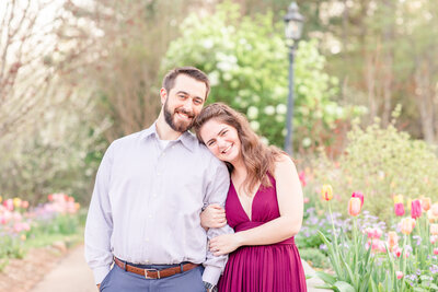 A couple at an engagement session at the State Botanical Garden of Georgia in Athens by Jennifer Marie Studios, light and airy Atlanta wedding photographer.
