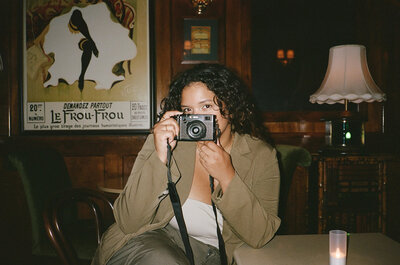 woman holding camera