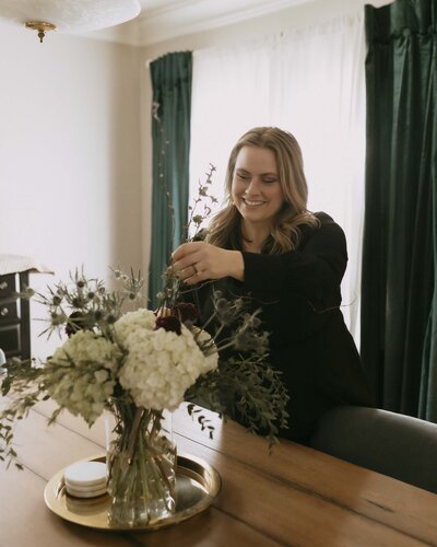 Renee Hoffman arranging flowers