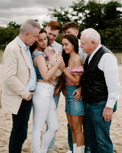 Extended Family Photo taken at the beach in Severna Park Maryland with mom, dad, baby, grandfather, great grandfather, brother, and girlfriend.