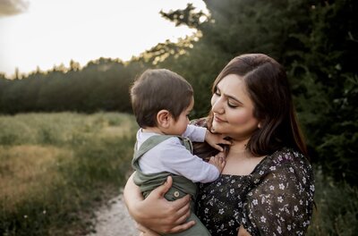 mom embraces her toddler