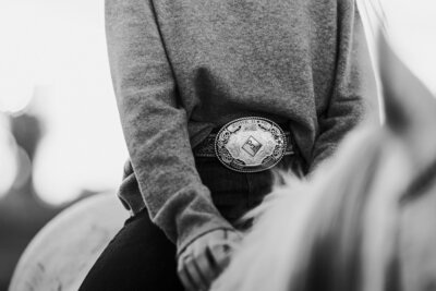 the belt buckle that a girl and her horse won capturing these memories for her to re-live all their hard work and success captured by an equine photographer in ontario