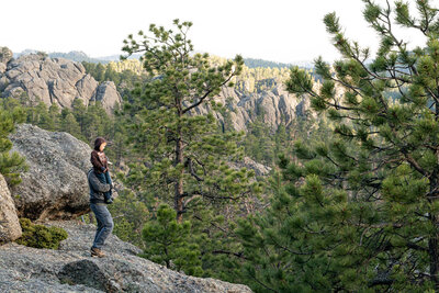 Mark and his son looking out across mountain valley