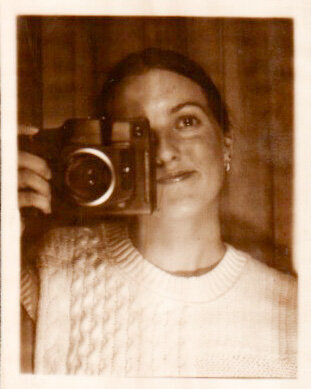 Film strip photo of bailee Bailee holding a camera up to her face