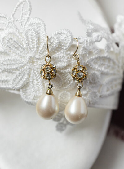 close up of bridal earrings