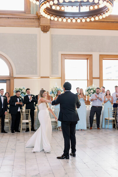 Bride and groom enjoying first dance at Ashton Depot wedding reception in Fort Worth by Kortney Boyett Photography