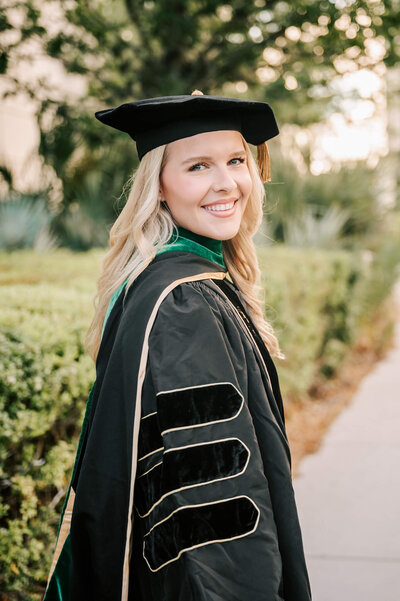 Mom to be in a white gown in Springs near Orlando