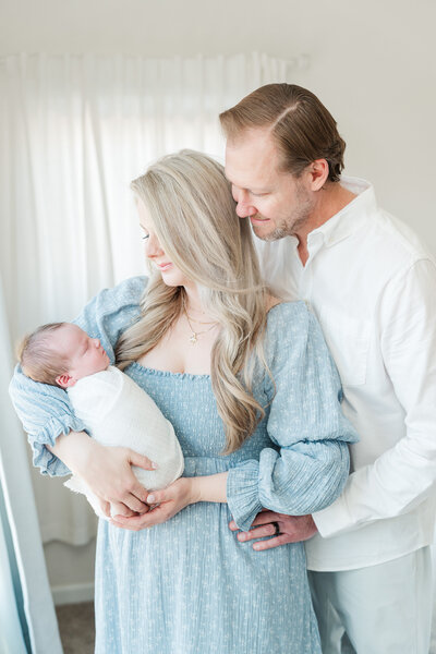 Light and neutral baby boy in home lifestyle newborn photos colorado elena spraguer photography 0019