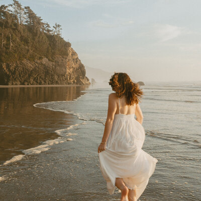 rocky beach senior portrait of teenage girl