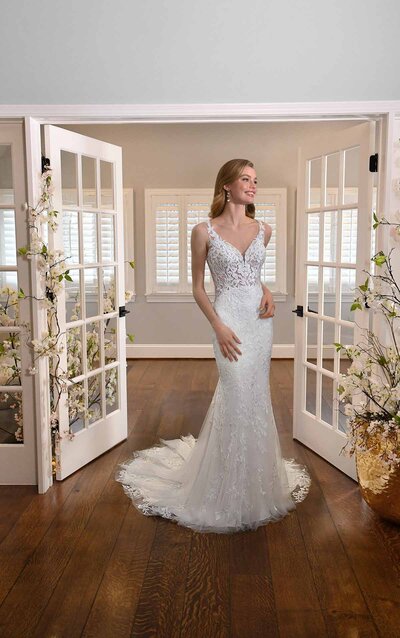 LACE AND TULLE A-LINE WEDDING DRESS WITH SQUARE NECKLINE The perfect complement to a modern love story, minimalists and romantics alike will adore this style from Martina Liana. Style 1244 features a classic, structured A-line silhouette with the ever-trending square neckline and wide straps. A striking contrast of bold laces and tiny 3D florals add coverage to the otherwise sheer bodice for a surprising twist, while slight shimmer elements add a subtle glow. The organic laces scatter down the full skirt, as the 3D florals of chiffon and organza petals increase in size toward the large floral motifs along the organic hemline. A low, open scoop back brings a simple yet timeless elegance to the design, while a subtle train completes the look with a light and airy finish.