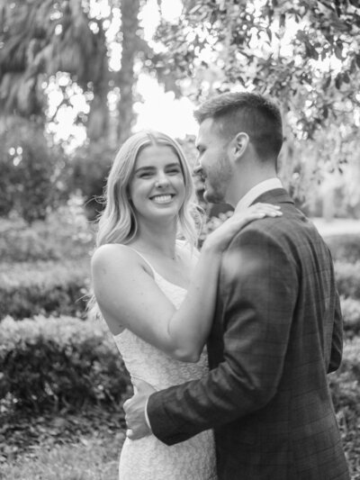 Sarasota wedding photographer captures the bride laughing on a sunny and humid wedding day in Florida.