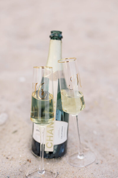 Newport Photographer Serving CT, RI, and beyond | The Corteses | Champagne bottle with two glasses