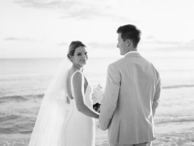 Bride and groom walk up memorial steps at their DC wedding