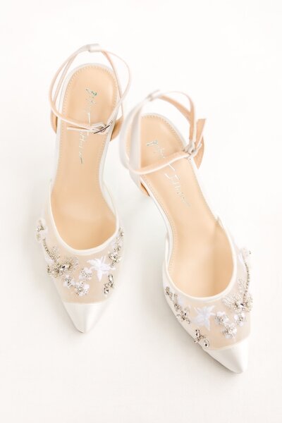 white and nude bridal shoes