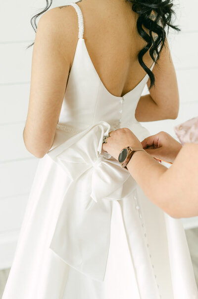 bride getting ready at the farmhouse