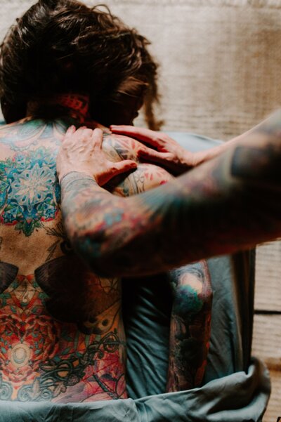 Kelly Howard is using somatic massage therapy skills to help a client with grief related ptsd
