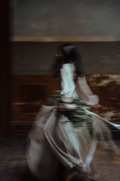 captures the essence of movement in a wedding portrait at Bendigo Town Hall, Victoria.