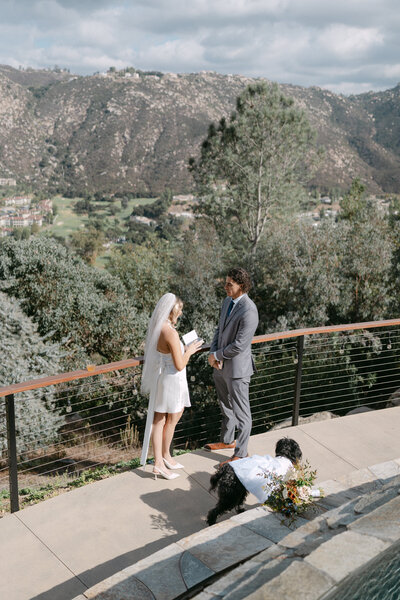 Couple saying their vows at their backyard wedding in California