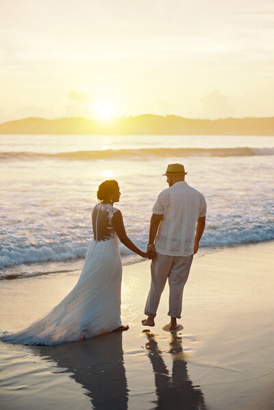 A couple at sunset at Macao Beach, pre-wedding proposal shoot