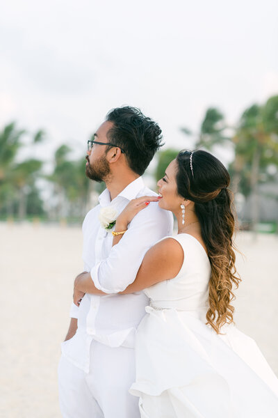 bride wearing Kleinfeld Bridal wedding dress