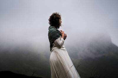 bride wrapped in shawl on the isle of skye during wedding