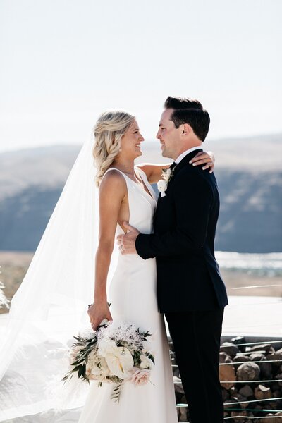 Couple Embracing After Ceremony - Blair & Jackson | Sagecliffe Resort & Inn Wedding Quincy Washington