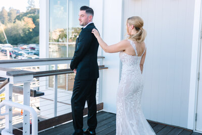 Bride and groom first look at San Francisco Yacht Club wedding venue, photo by Anastasiya Photography - San Francisco Wedding Photographer