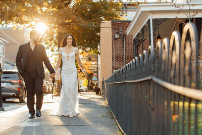 Lambertville | Bride and groom walking down the street during wedding photo | Near Unionville Vineyards, Ringoes, New Jersey
