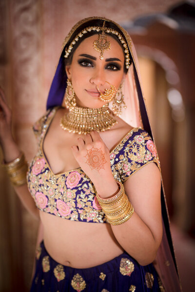 sikh bride showing henna on her hands