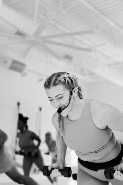 woman working out in a barre class