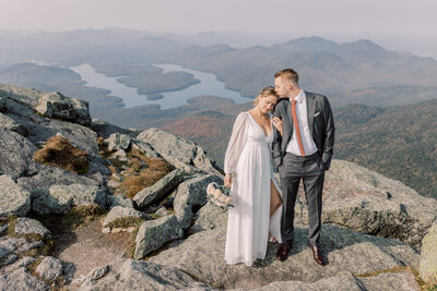 Couple exchanging vows during the Fall season in Upstate NY in Lake Placid.