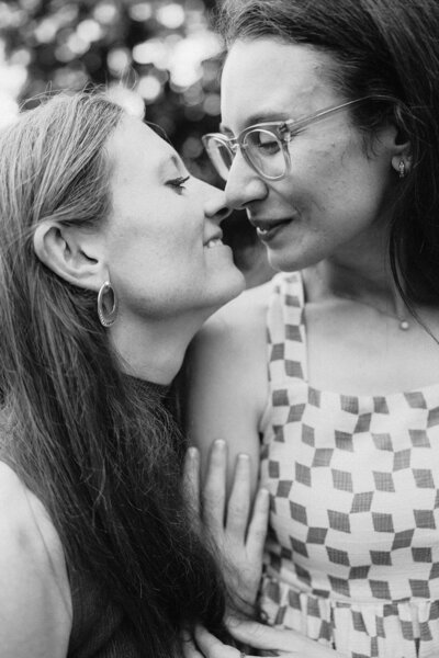 Women touching noses, engagement shoot in Finger Lakes, New York