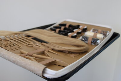 aesthetic beige leather hair extension tool kit with pliers bead looper clips needles and thread