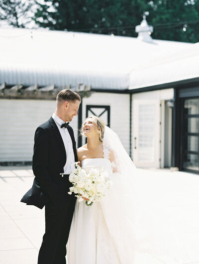 Couple walking in front of wedding venue taken by washington dc photographers for wedding