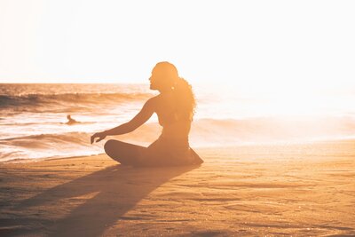 Woman sitting on beach