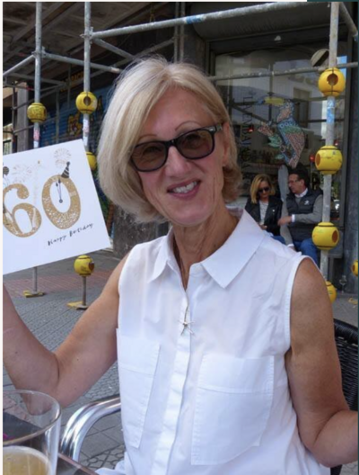 woman celebrating her 60th