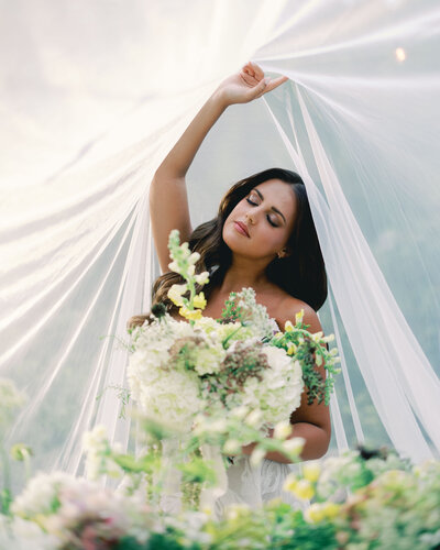 Bride and grooms hands reaching