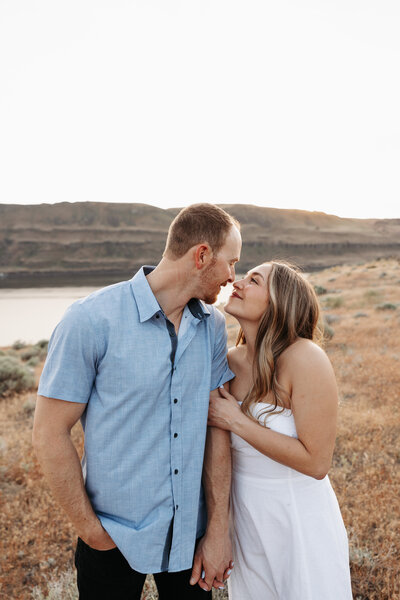 Couple standing at Twin Sisters Rock