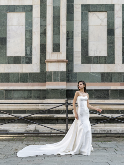 Strapless drop waist trumpet gown with detachable bow train