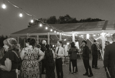 string lights hanging at Startlit Point wedding venue at night 