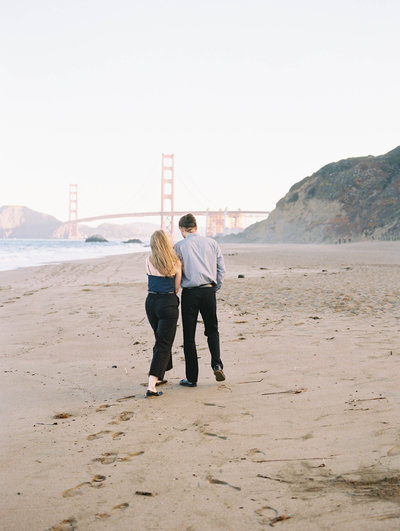 Couple with the golden gate bridge in background