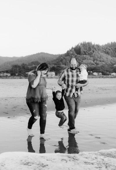 Hope's family running on the beach.