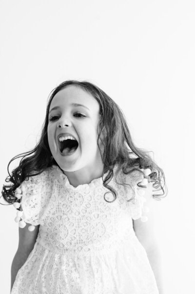 Girl laughing big