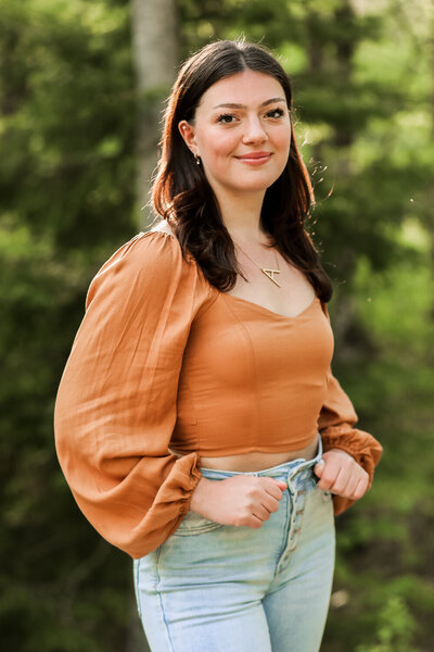 Photo of Senior girl with orange shirt | Senior Portrait Phtography