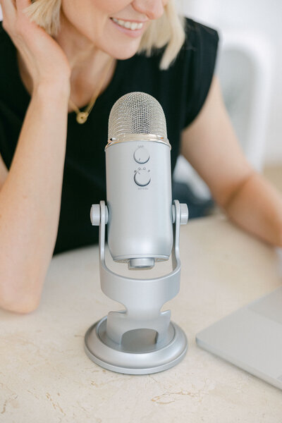 Zelda Green, financial educator and podcaster, working on recording her podcast episodes