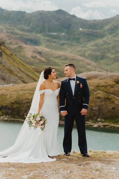 Bride and groom in Hatcher Pass, Alaska on a summer day.