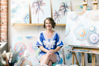 Shelby Dillon sitting in her studio from where she teaches her online course